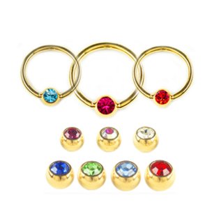 Goldener Ohr oder Lippen Piercing Ring mit Glitzerstein Kugel in verschiedenen Farben